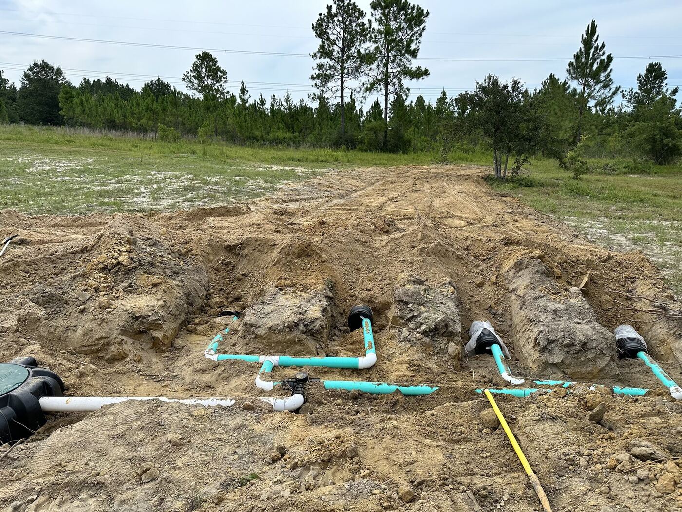 New septic field line connections before backfill