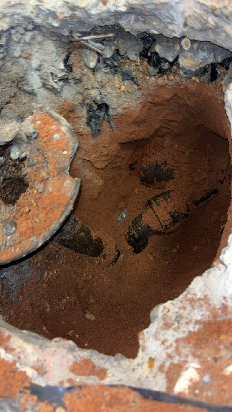 Excavated access below the slab during drain-line repair